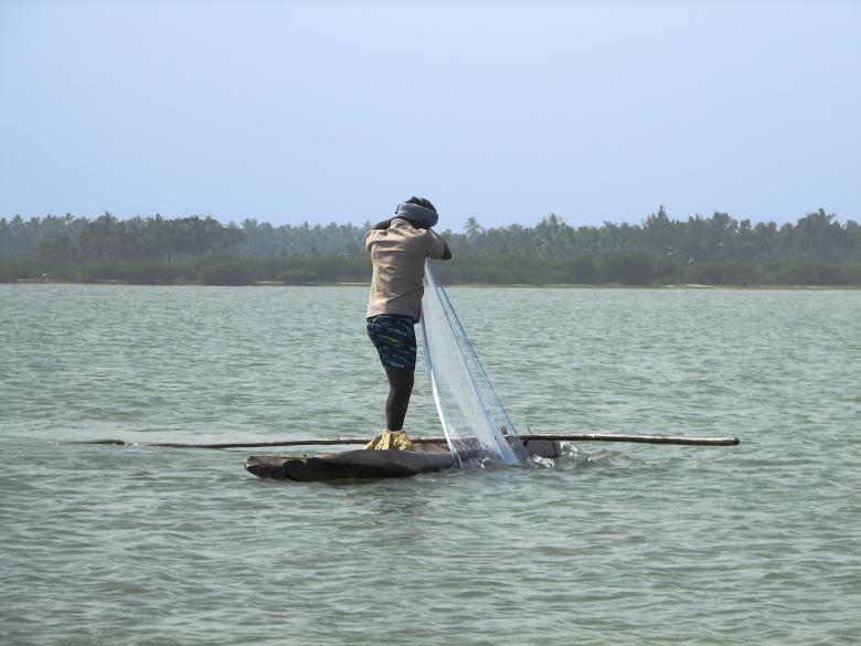 Free stock image of Fisherman in a log boat created by Sundeep Goel