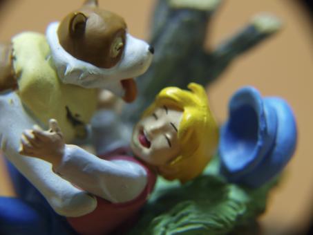Boy and dog, macro toys