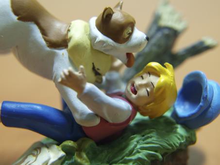 Boy and dog, macro toys