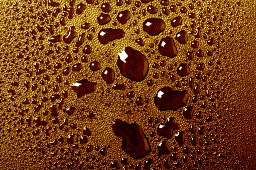 Free Stock Photo of Orange water drops macro background