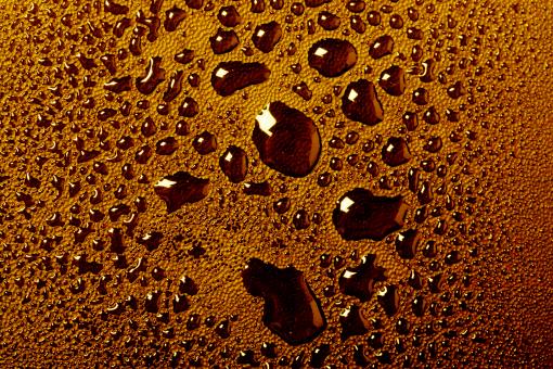 Free Stock Photo of Orange water drops macro background