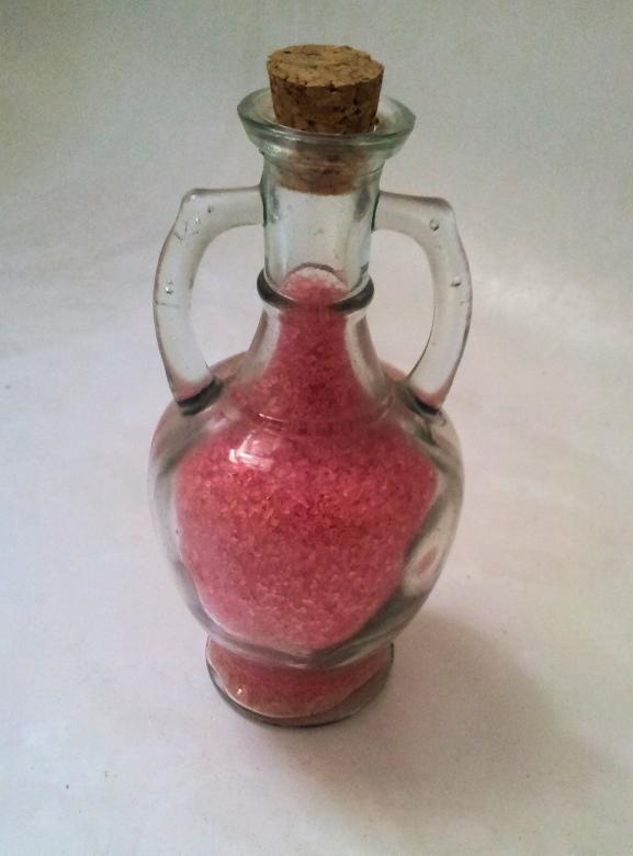 Free stock image of Decorated glass bottle with red bath sal created by David Pellon