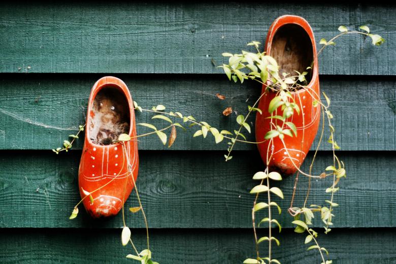 Free stock image of clogs hanging on fence created by Luka