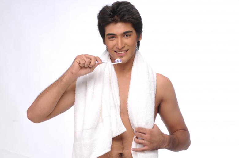 Free stock image of young man Brushing teeth created by Throughthelens