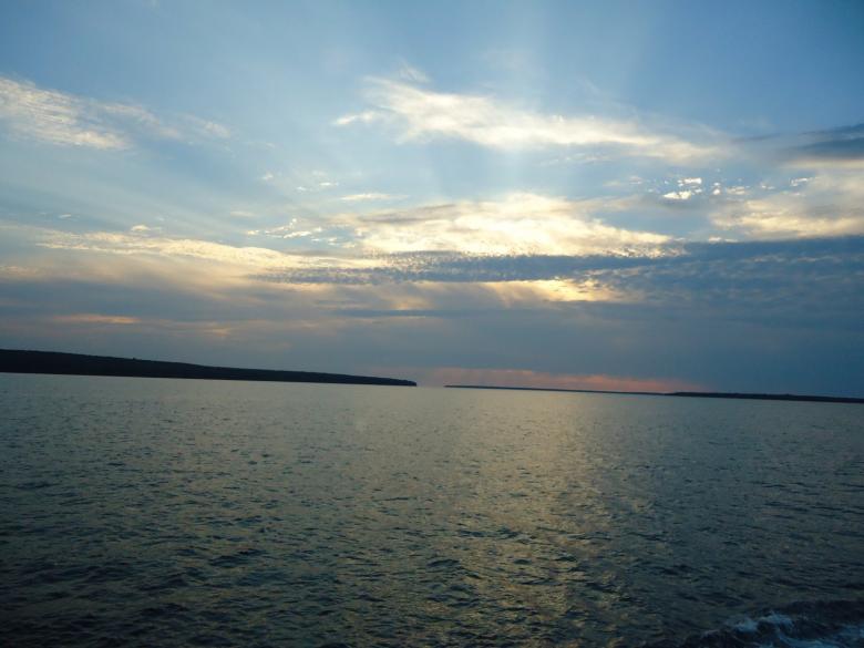 Free stock image of Sunset behind clouds on superior created by Yinan Chen
