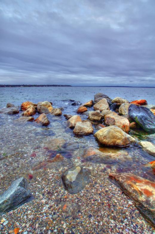 Free stock image of Rocks at the beach created by agphotostock.com