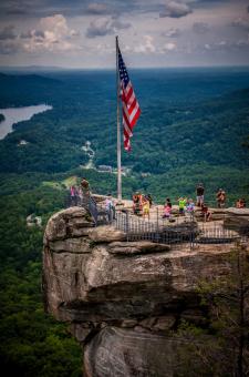 Free Stock Photo of USA flag on top of cliff