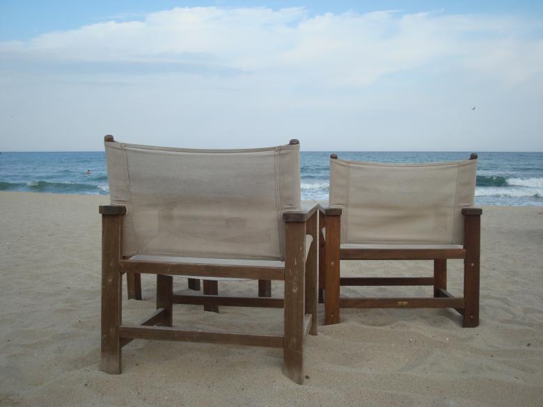 Free stock image of Two chairs on the beach created by Boris Kyurkchiev