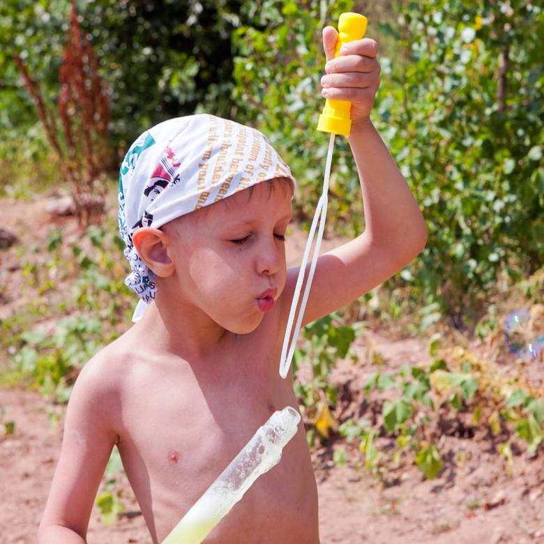 Free stock image of Boy blowing soap bubbles created by 2happy