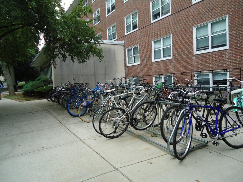 Free stock image of Bikes in a bike rack 2 created by Katharine Sparrow