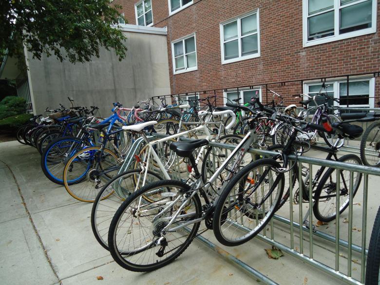 Free stock image of Bikes in a bike rack created by Katharine Sparrow