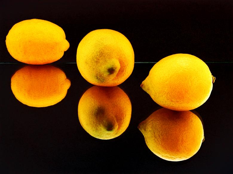Free stock image of Lemons on black created by 2happy