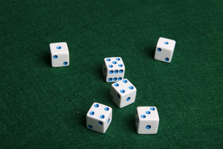 Free stock image of Dice on green felt table created by Jared Davidson