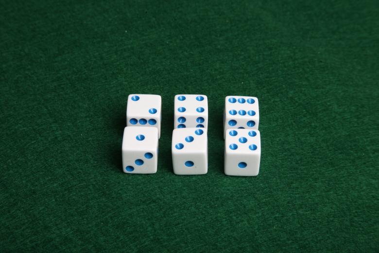 Free stock image of Dice on green felt table created by Jared Davidson