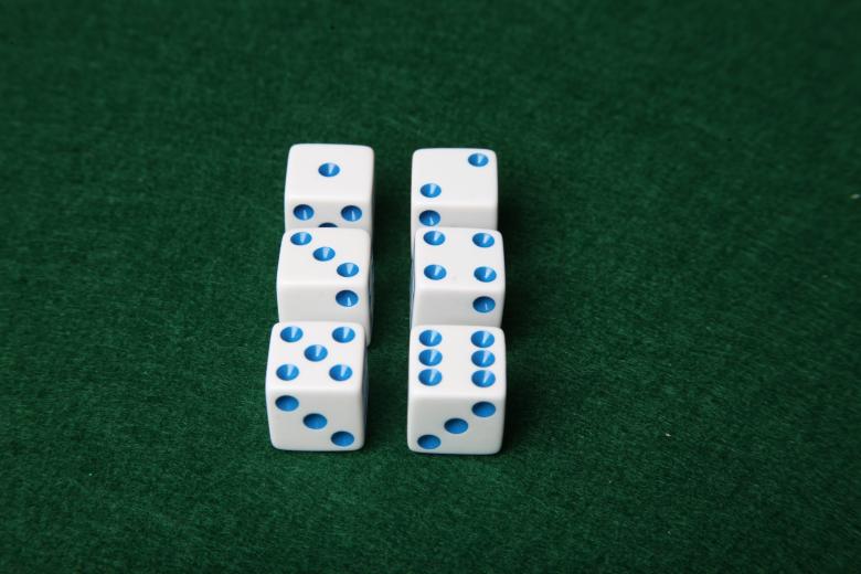 Free stock image of Dice on green felt table created by Jared Davidson