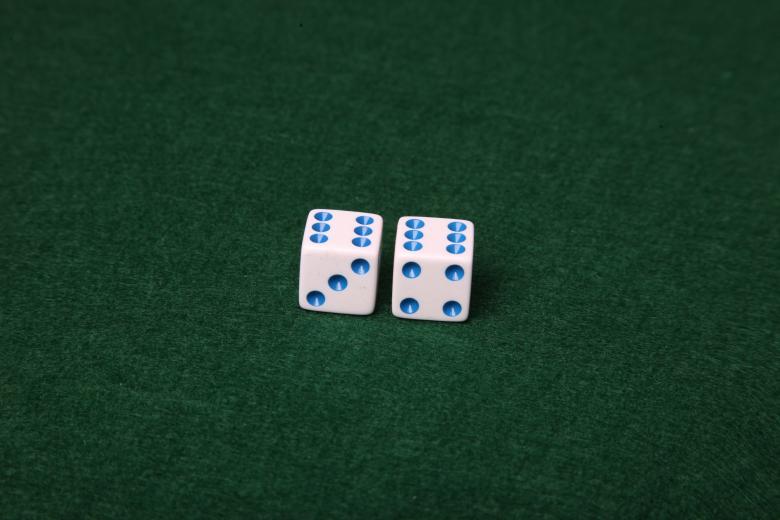 Free stock image of Dice on green felt table created by Jared Davidson