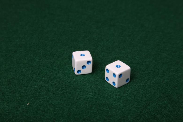 Free stock image of Dice on green felt table created by Jared Davidson