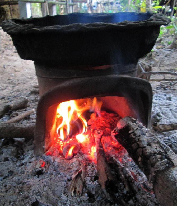 Free stock image of Three burning billets in hot stove created by Galayanee