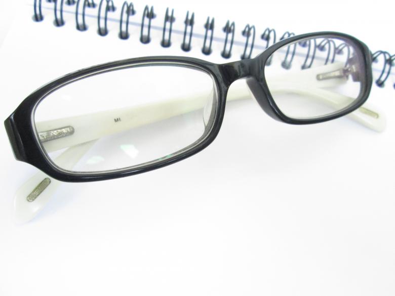 Free stock image of Eye Glasses with Book created by Galayanee