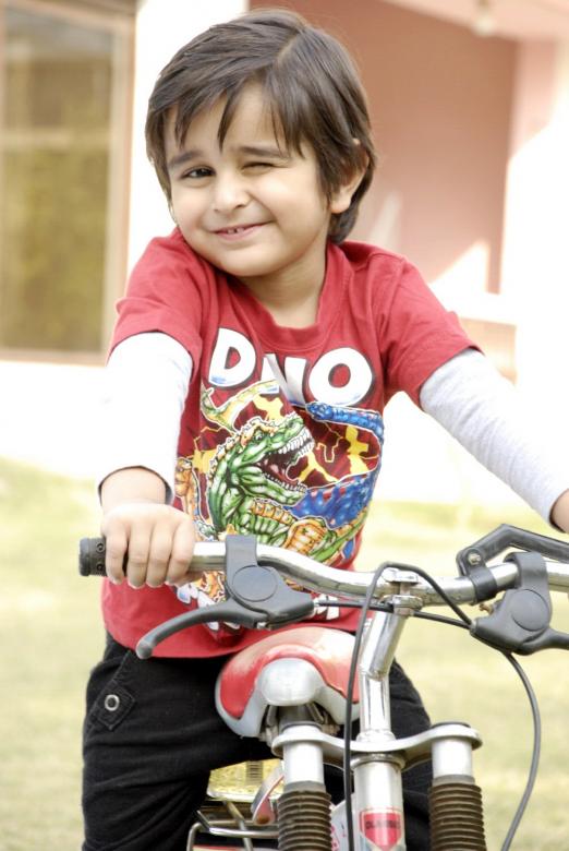 Free stock image of Baby Boy Winking Eye Mischievously created by Bilal Aslam