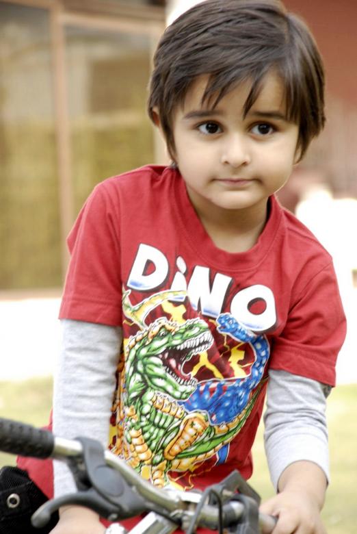 Free stock image of Cute Kid with Bicycle created by Bilal Aslam
