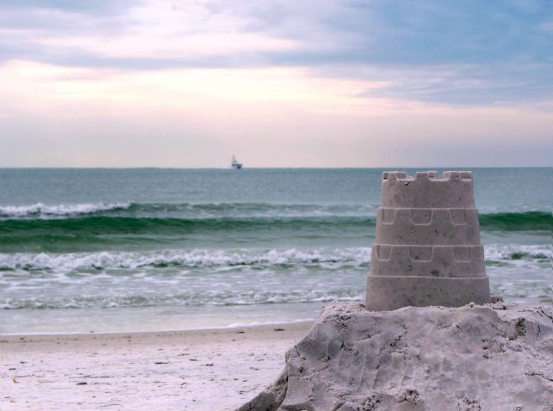 Free stock image of A sandcastle overlooking the ocean created by Benjamin Miller