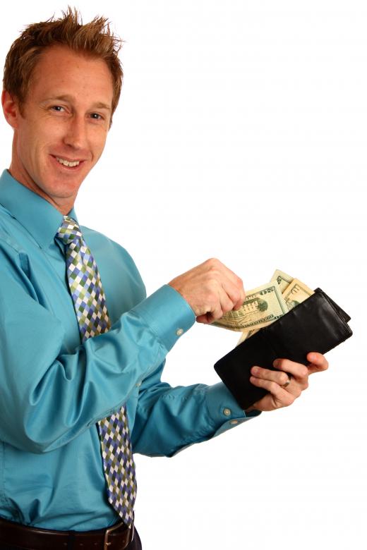 Free stock image of A young businessman holding a wallet created by Benjamin Miller