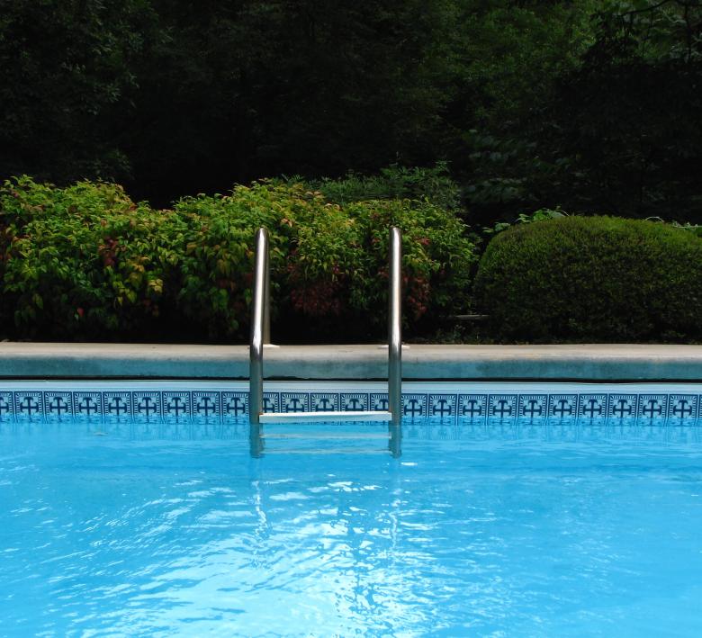 Free stock image of A ladder in a swimming pool created by Benjamin Miller