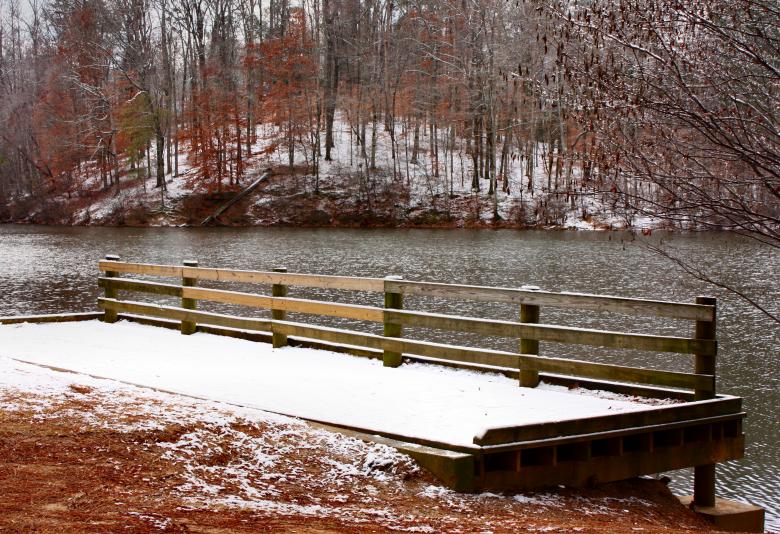 Free stock image of A snow covered dock by a lake created by Benjamin Miller