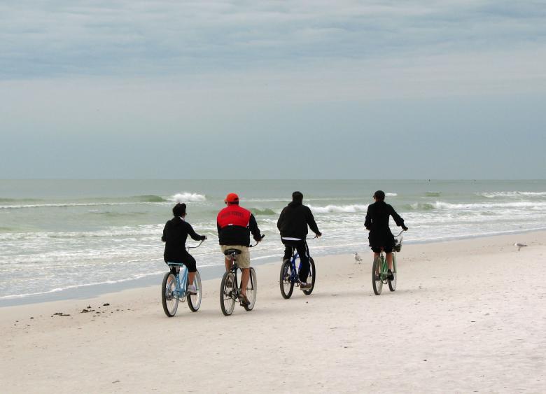 Free stock image of People riding bikes on the beach created by Benjamin Miller