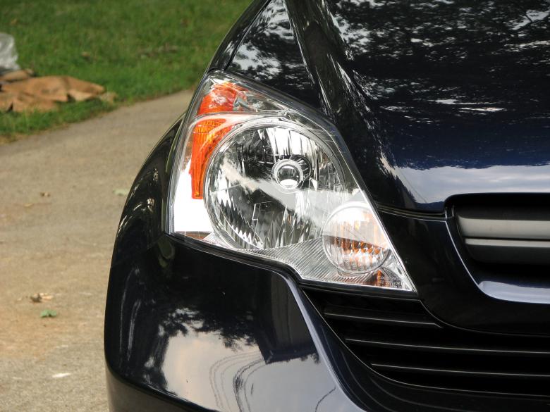 Free stock image of Closeup of a car headlight created by Benjamin Miller