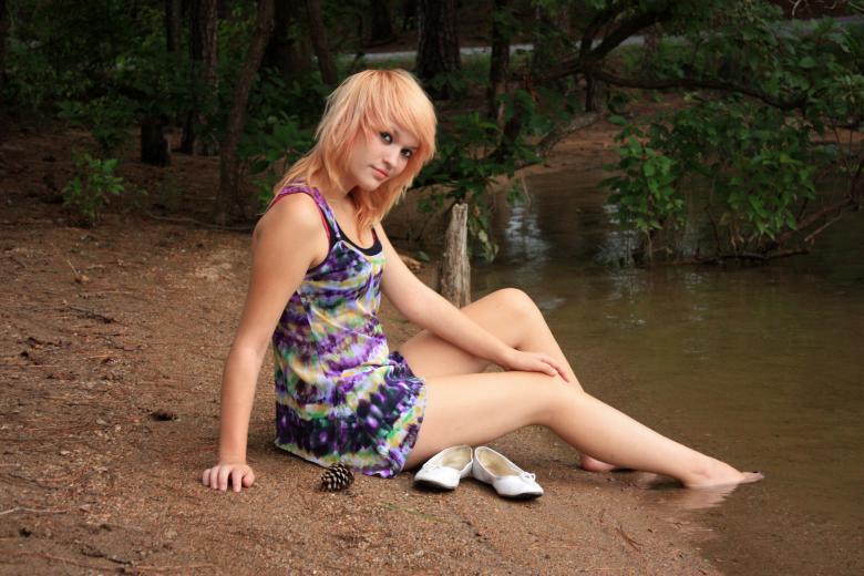 Free stock image of Young woman posing on the shore created by Benjamin Miller
