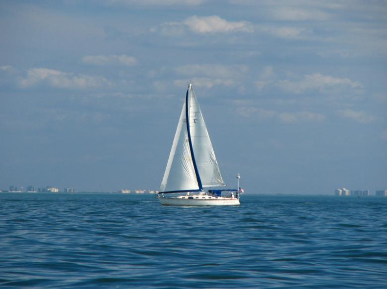 Free stock image of A sailboat on the ocean created by Benjamin Miller