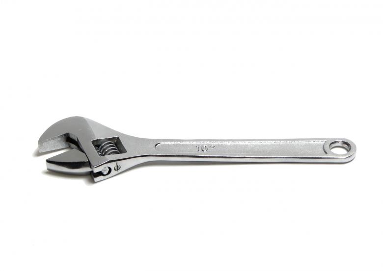 Free stock image of An adjustable wrench isolated on white created by Benjamin Miller