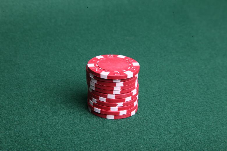 Free stock image of Red poker chips on green felt. created by Jared Davidson