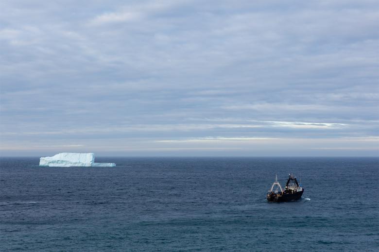 Free stock image of Trawler and iceberg created by Geoffrey Whiteway