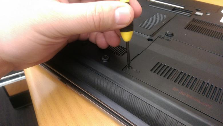 Free stock image of Hand holding a laptop screwdriver created by Jared Davidson