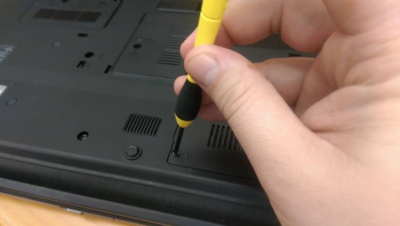 Free stock image of Hand holding a laptop screwdriver created by Jared Davidson