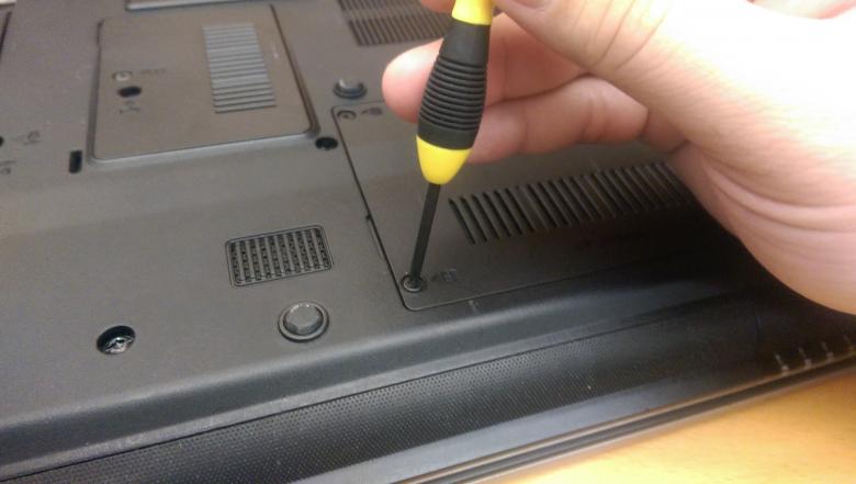 Free stock image of Hand holding a laptop screwdriver created by Jared Davidson