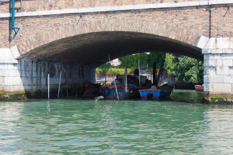 Free stock image of Boats moored under bridge created by Geoffrey Whiteway