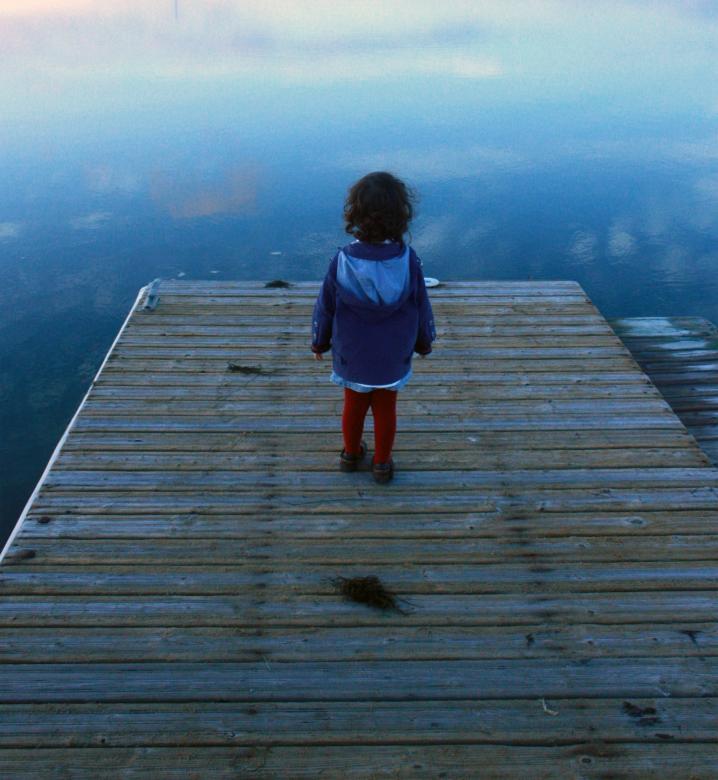 Free stock image of Child looking out on the pier created by Jack Moreh
