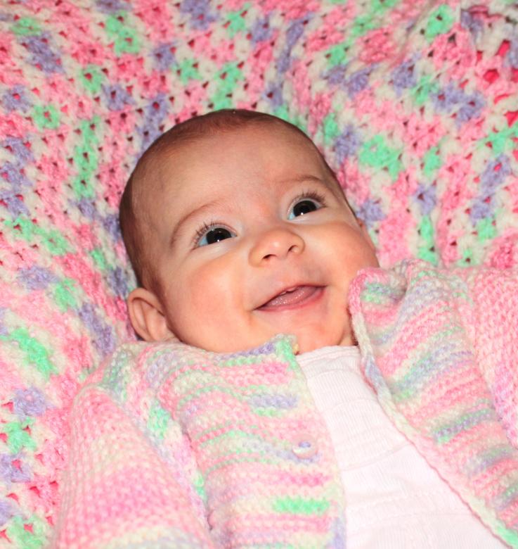 Free stock image of Happy baby lying on a blanket created by Jack Moreh