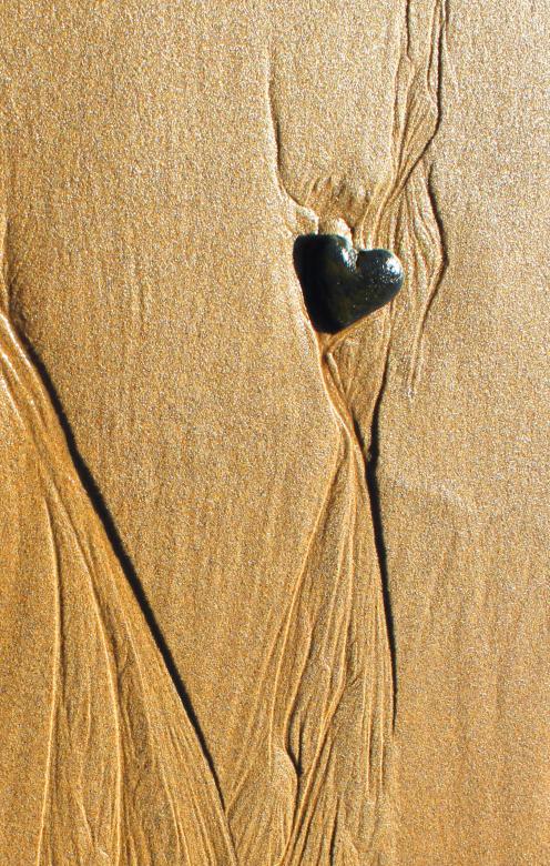 Free stock image of Heart-shaped pebble in the sand created by Jack Moreh