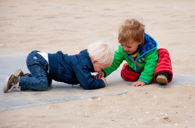 Free stock image of Kids playing on the beach created by Luka