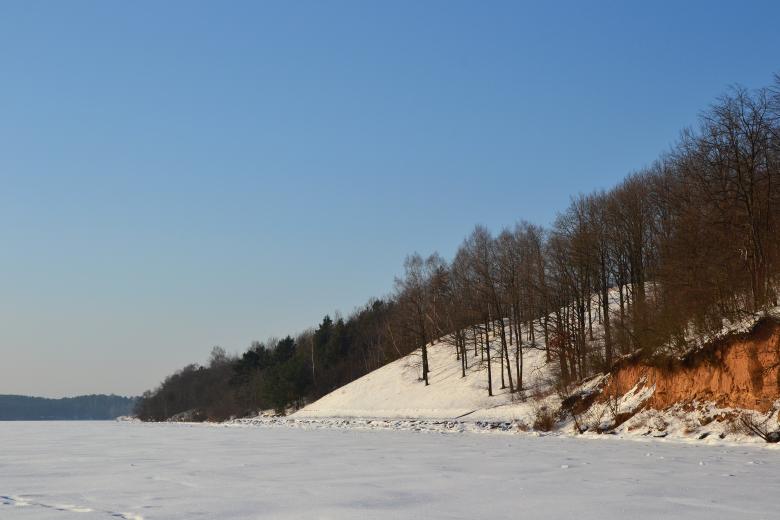 Free stock image of Snow on frozen lake created by Tomas Adomaitis