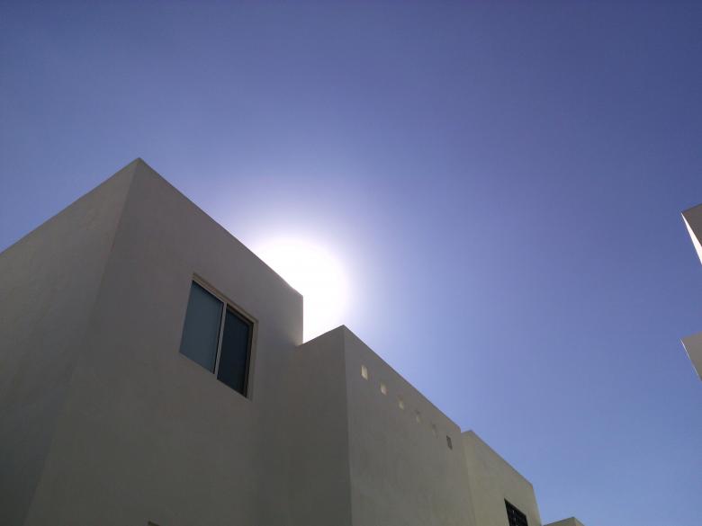 Free stock image of White house and blue sky created by MAKAKIKUS