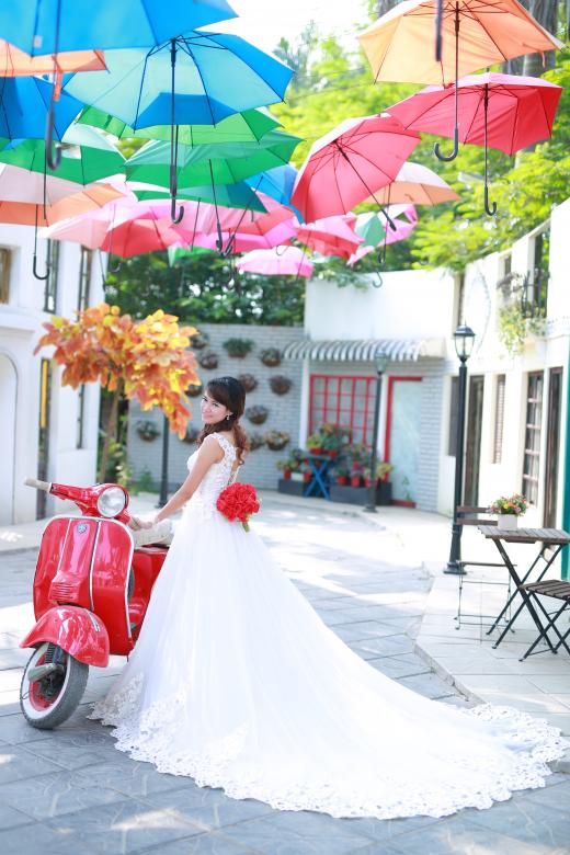 Free stock image of Bride posing with red scooter created by Nga Le