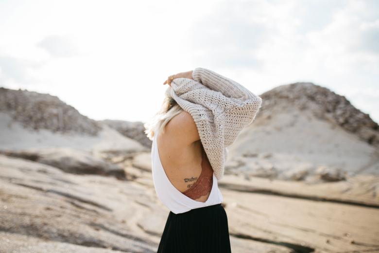 Free stock image of Girl Taking Off Her Sweater created by StockSnap
