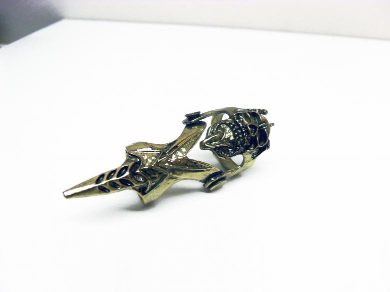 Free stock image of Gold tone gothic finger armor ring created by David M