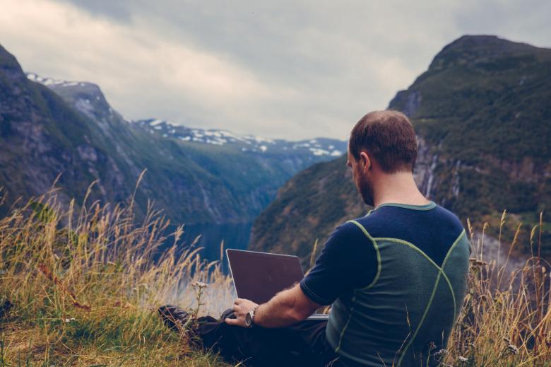 Free stock image of Man Using Laptop created by StockSnap